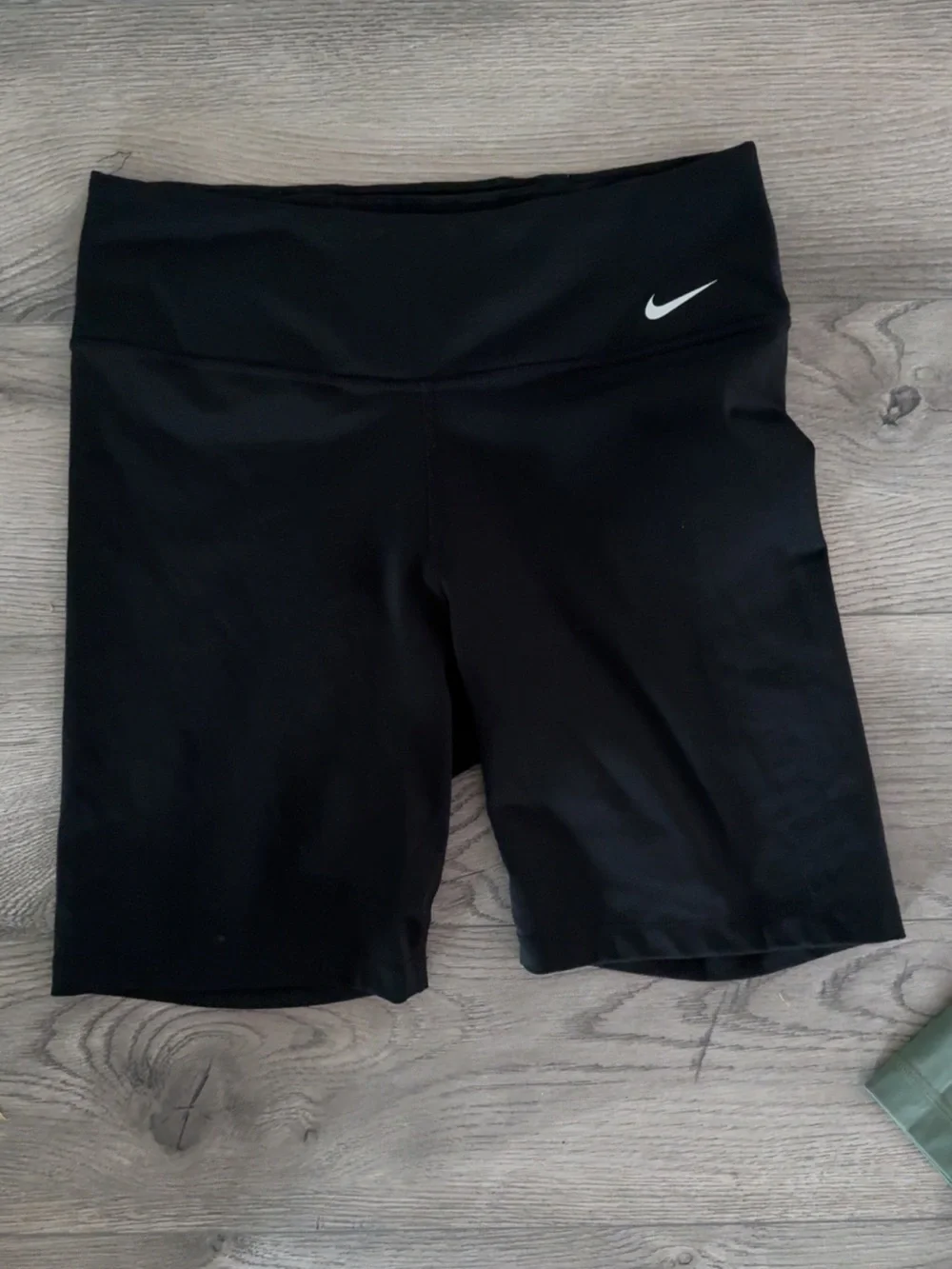 Nike Women's Black Mid-Rise Bike Shorts with White Swoosh